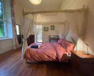Double room with four posted bed, ensuite bathroom and amazing views