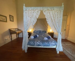 Double room with four posted bed, ensuite bathroom and amazing views