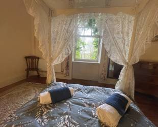 Double room with four posted bed, ensuite bathroom and amazing views