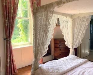 Double room with four posted bed, ensuite bathroom and amazing views