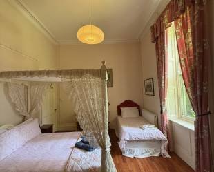 Double room with four posted bed, ensuite bathroom and amazing views