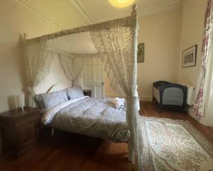 Double room with four posted bed, ensuite bathroom and amazing views