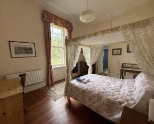 Double room with four posted bed, ensuite bathroom and amazing views