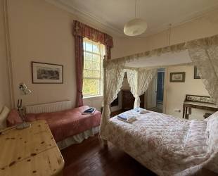 Double room with four posted bed, ensuite bathroom and amazing views