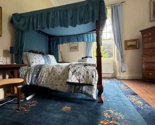 Master Bedroom with four posted bed,  garden and river view