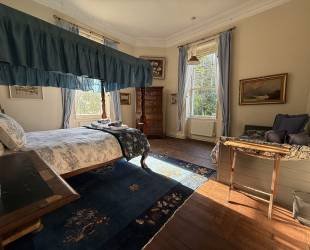 Master Bedroom with four posted bed,  garden and river view