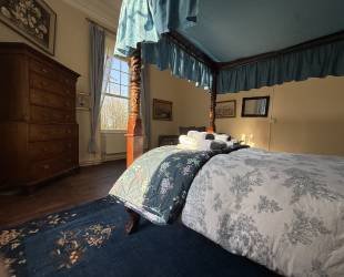 Master Bedroom with four posted bed,  garden and river view