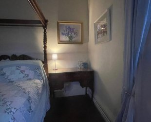 Master Bedroom with four posted bed,  garden and river view