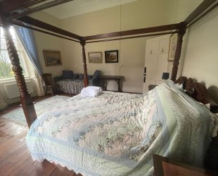 Master Bedroom with four posted bed,  garden and river view