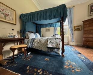 Master Bedroom with four posted bed,  garden and river view