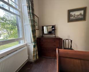 Double bedroom with garden and woodland view
